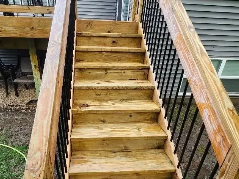 Wooden deck stairs clean and bare after cleaning
